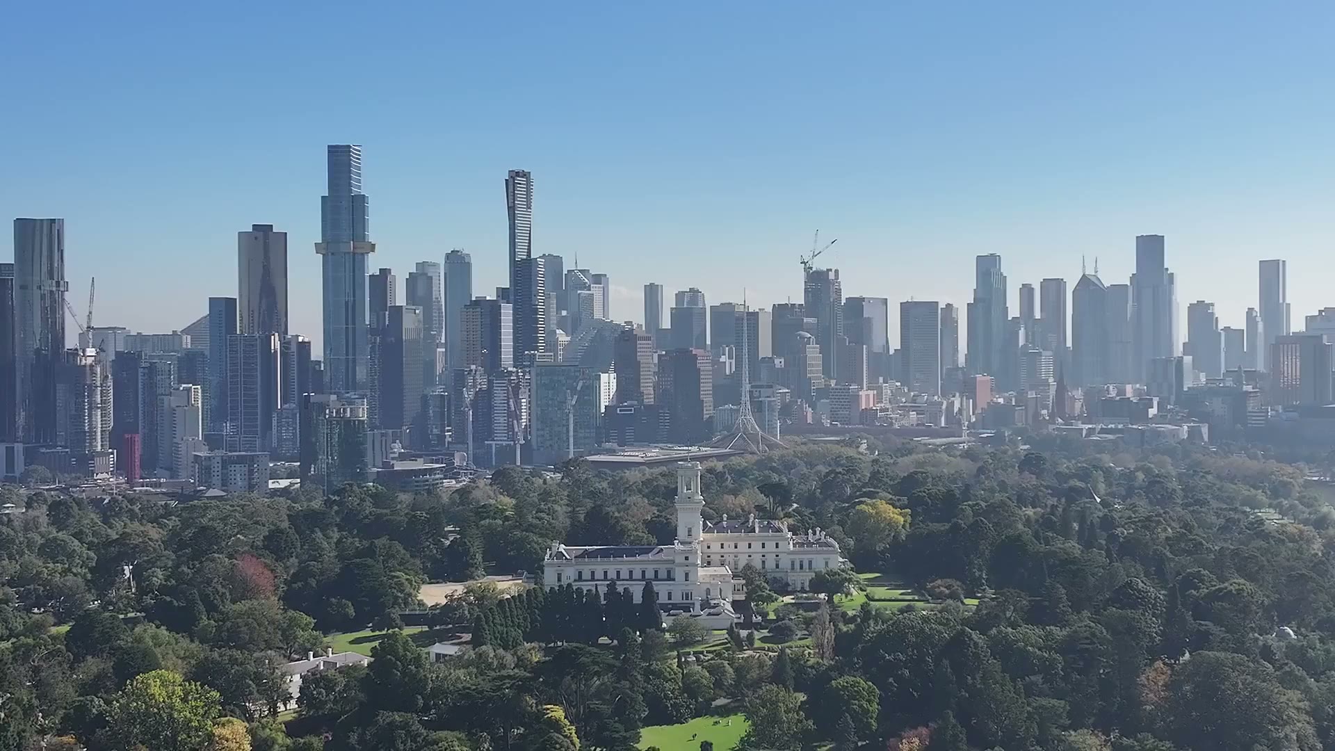 Aerial view of Government House and the Melbourne skyline