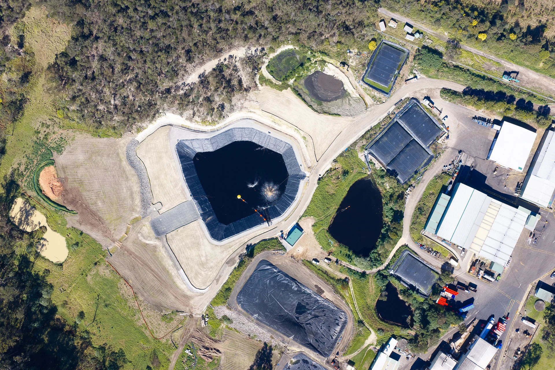 Aerial overview of the new cooling dam within the operating facility