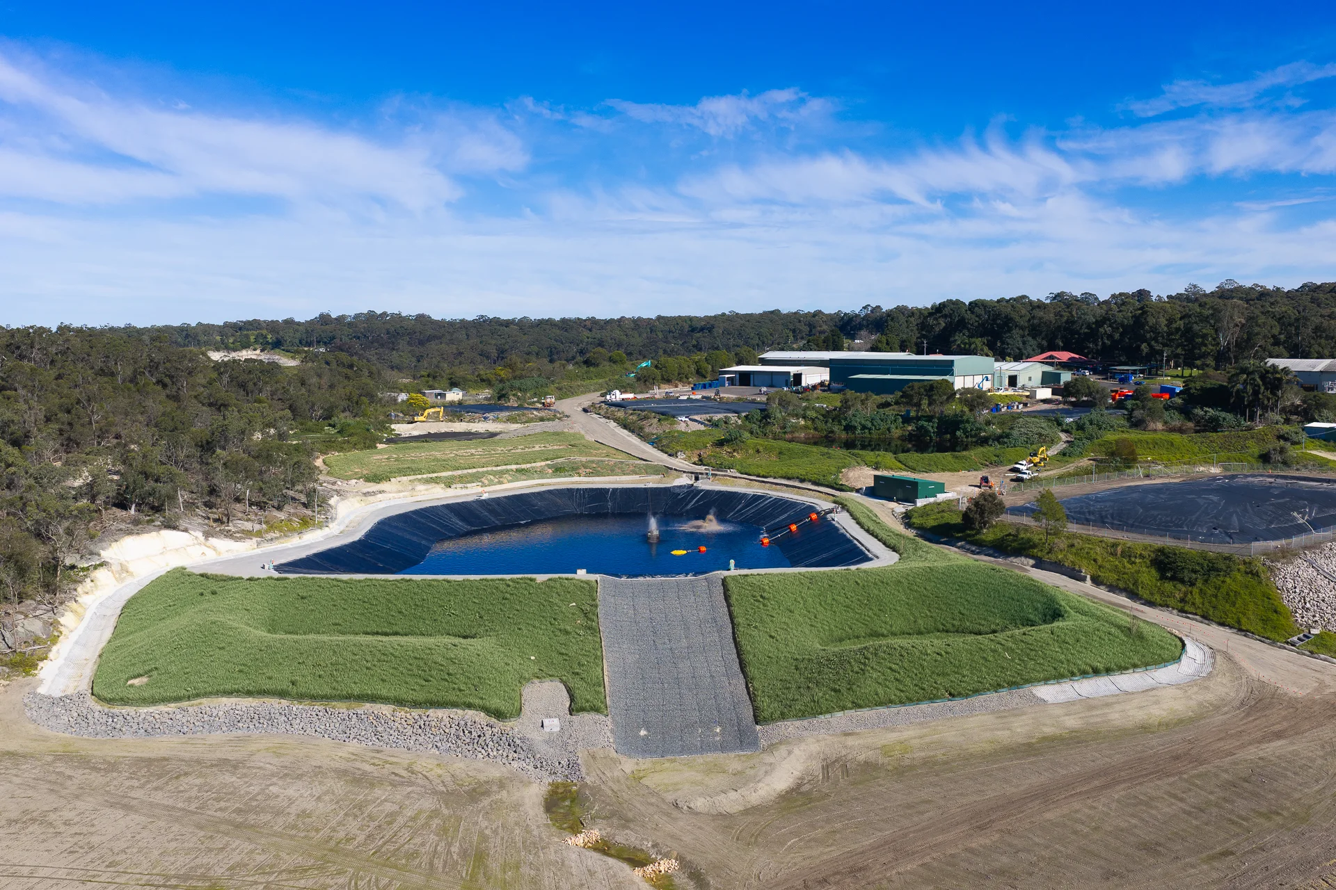Completed cooling dam, stabilised embankments and new pumphouse