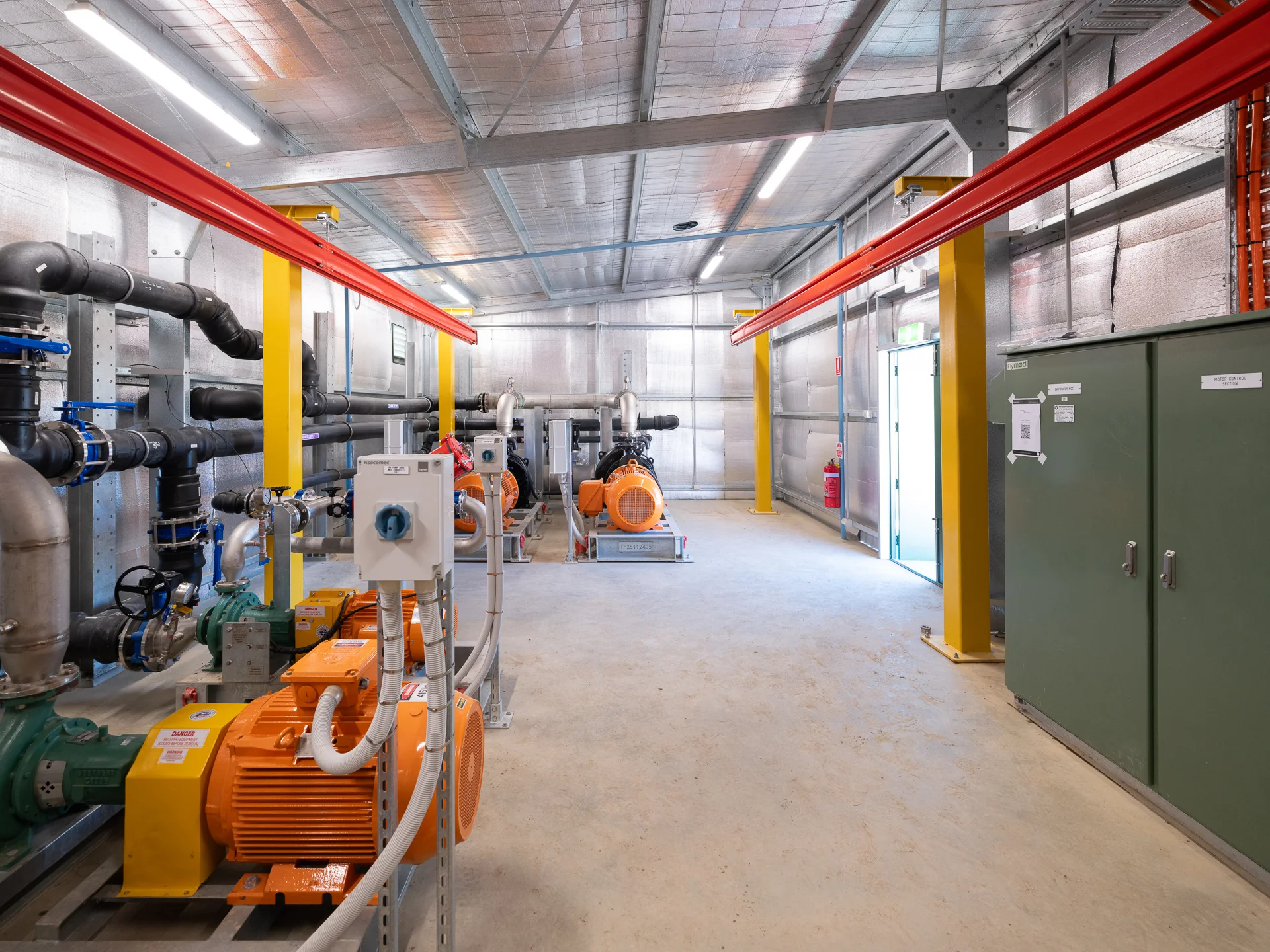 Mechanical and electrical infrastructure inside the completed pumphouse